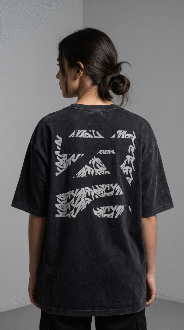 firefly gemini flash ultra realistic studio photo of a young female model wearing an oversized black t shi 134598 (1)