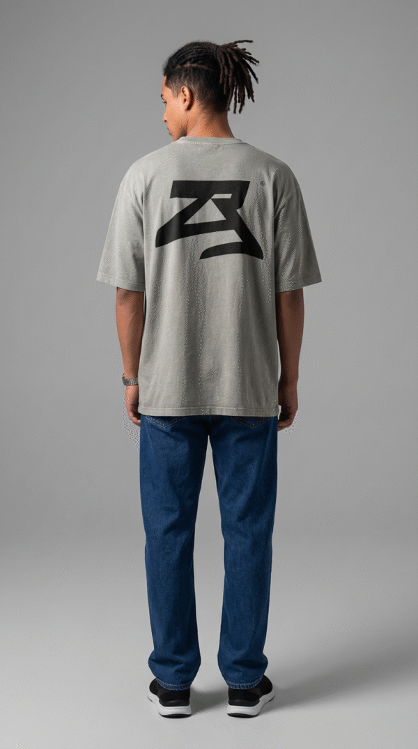 firefly gemini flash ultra realistic studio photo of a young male model wearing an oversized light grey st 134598 (1)