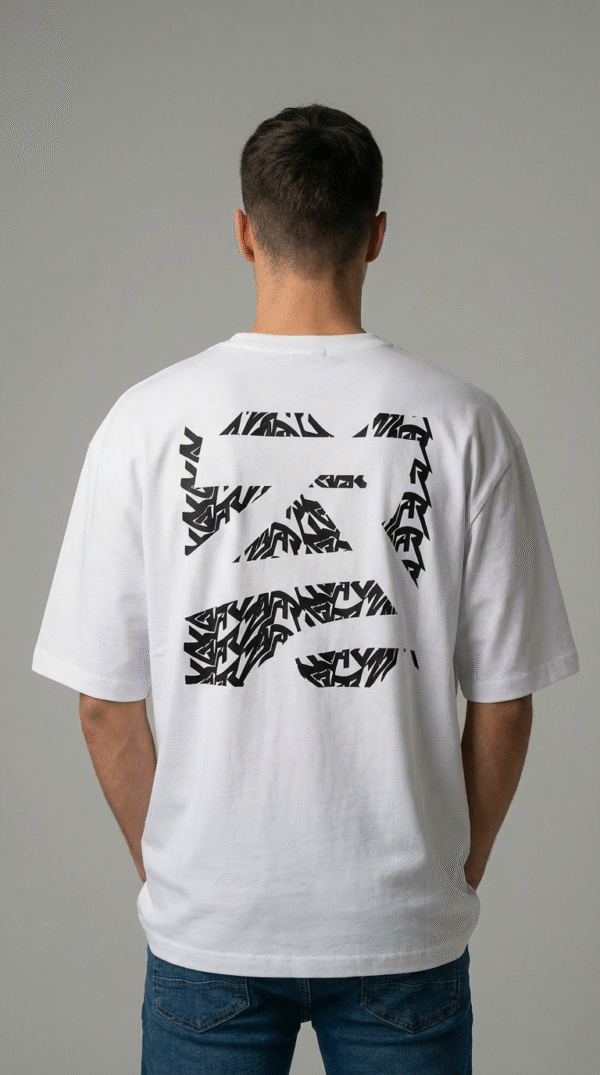 firefly gemini flash ultra realistic studio photo of a young male model wearing an oversized white t shirt 134598 (1)